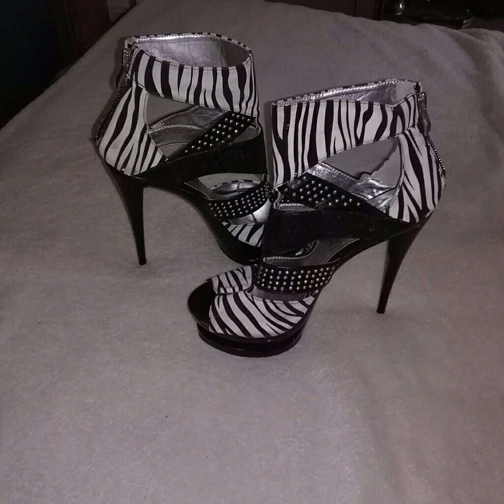 Privileged zebra print heels
